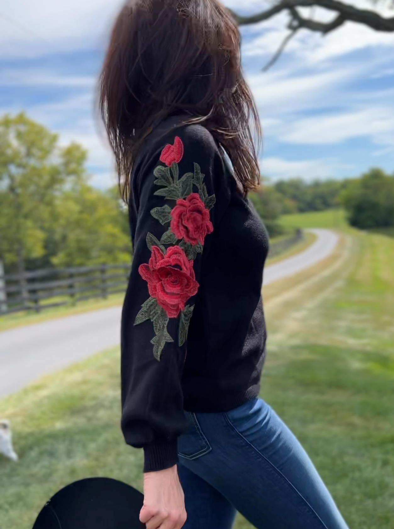 Black sweater with roses on sleeves discount