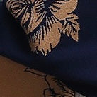 Reversible Peony Jacquard shawl with Arm Openings- Navy/Sand